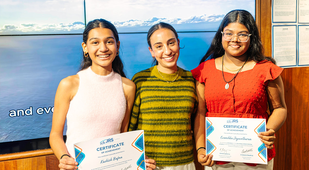 Photo: JRS’s Kristen Lazarus (centre) with award recipients Kashish (L) and Evanshka (R)