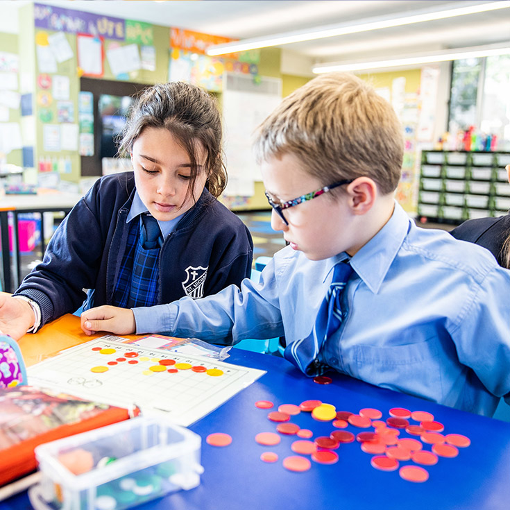Boy and girl leaerning maths at St Michael's Catholic Primary Baulkham Hills