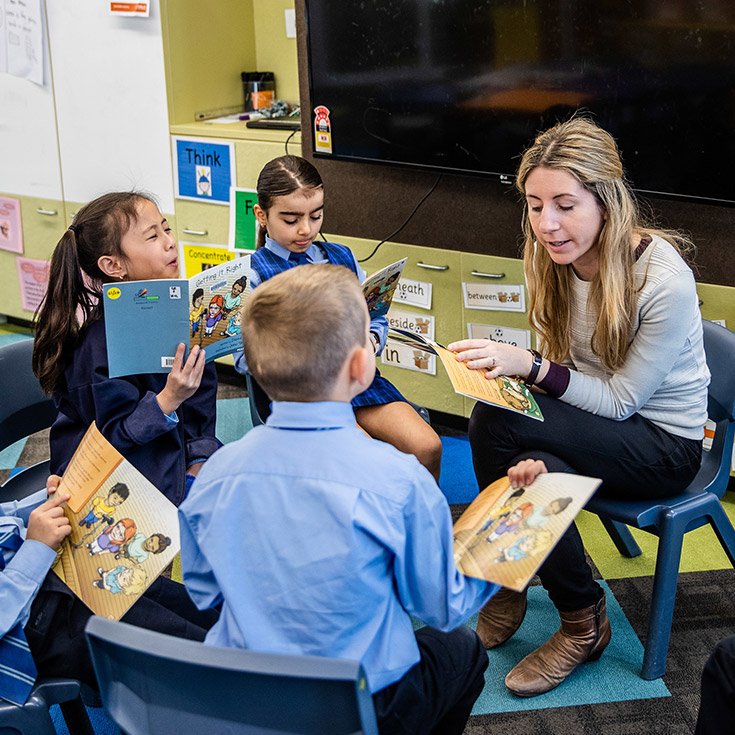Teacher with students at St Michael's Catholic Primary Baulkham Hills